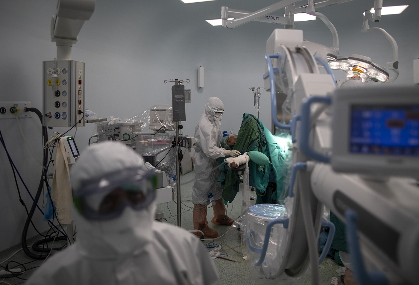 Medical workers wearing Personal Protective Equipment (PPE) perform surgery on to COVID-19 patient at the Sancaktepe Martyr Prof Dr Ilhan Varank Training and Research Hospital in Istanbul, Turkey, 11 May 2020.
