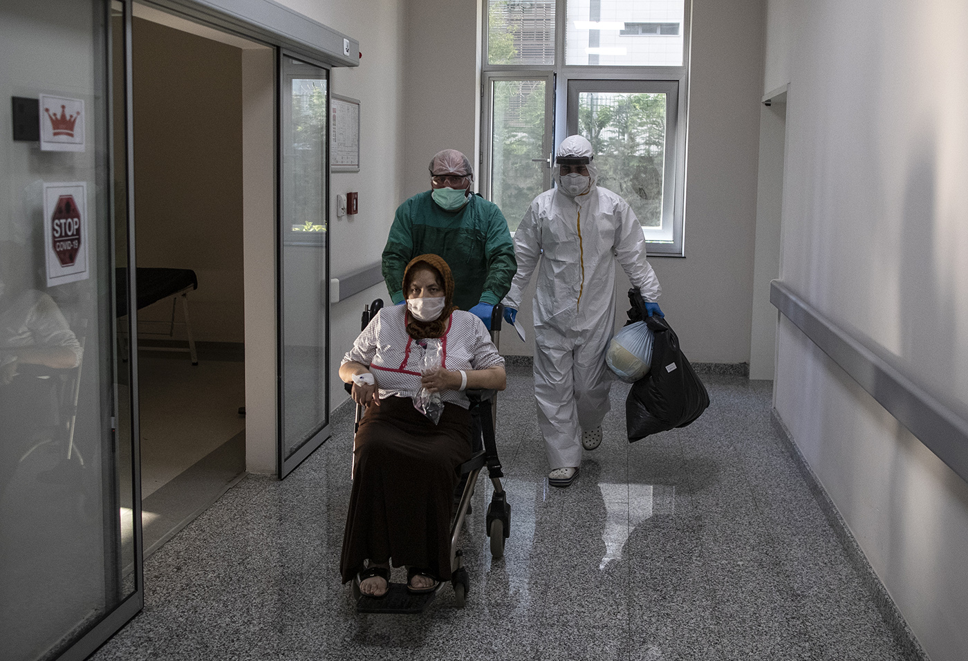Medical workers waer Personal Protective Equipment (PPE) carry a COVID-19 patient at the emergency service of the Sancaktepe Martyr Prof Dr Ilhan Varank Training and Research Hospital in Istanbul, Turkey, 11 May 2020.