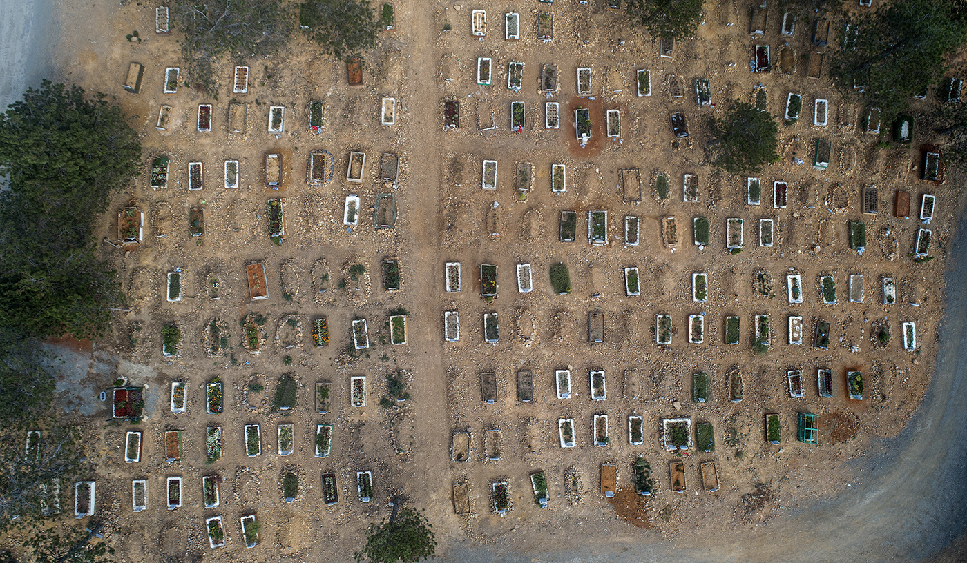 An aerial picture taken by drone shows newly buried graves of Covid-19 victims at the Baklaci cemetery in Istanbul, Turkey, 18 September 2020. 