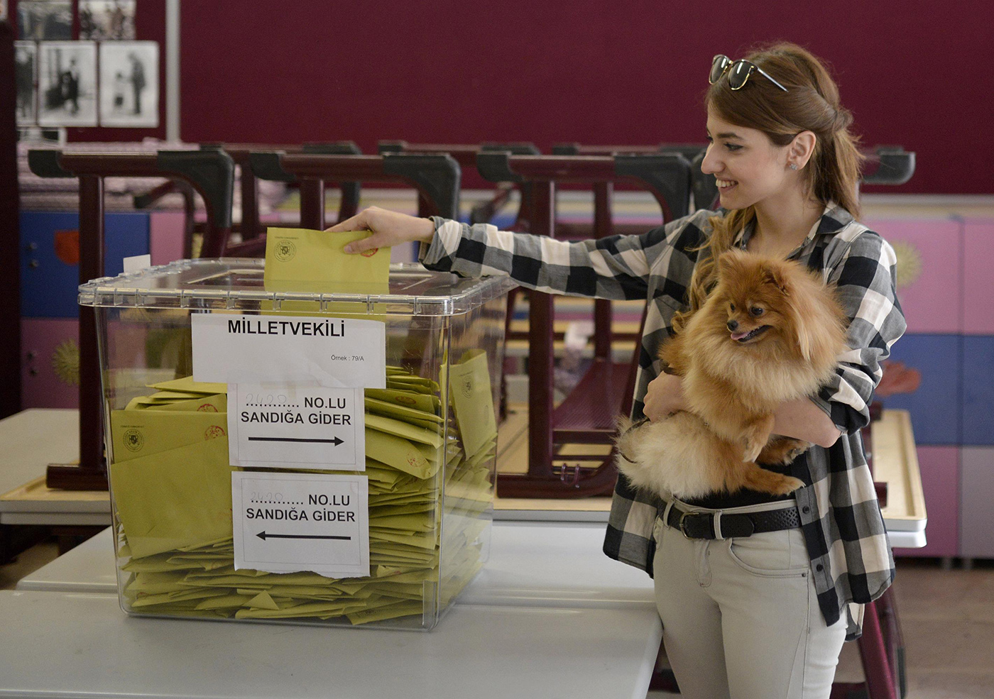 A woman casts her vote at a polling station in Istanbul, Turkey on 07 June 2015.