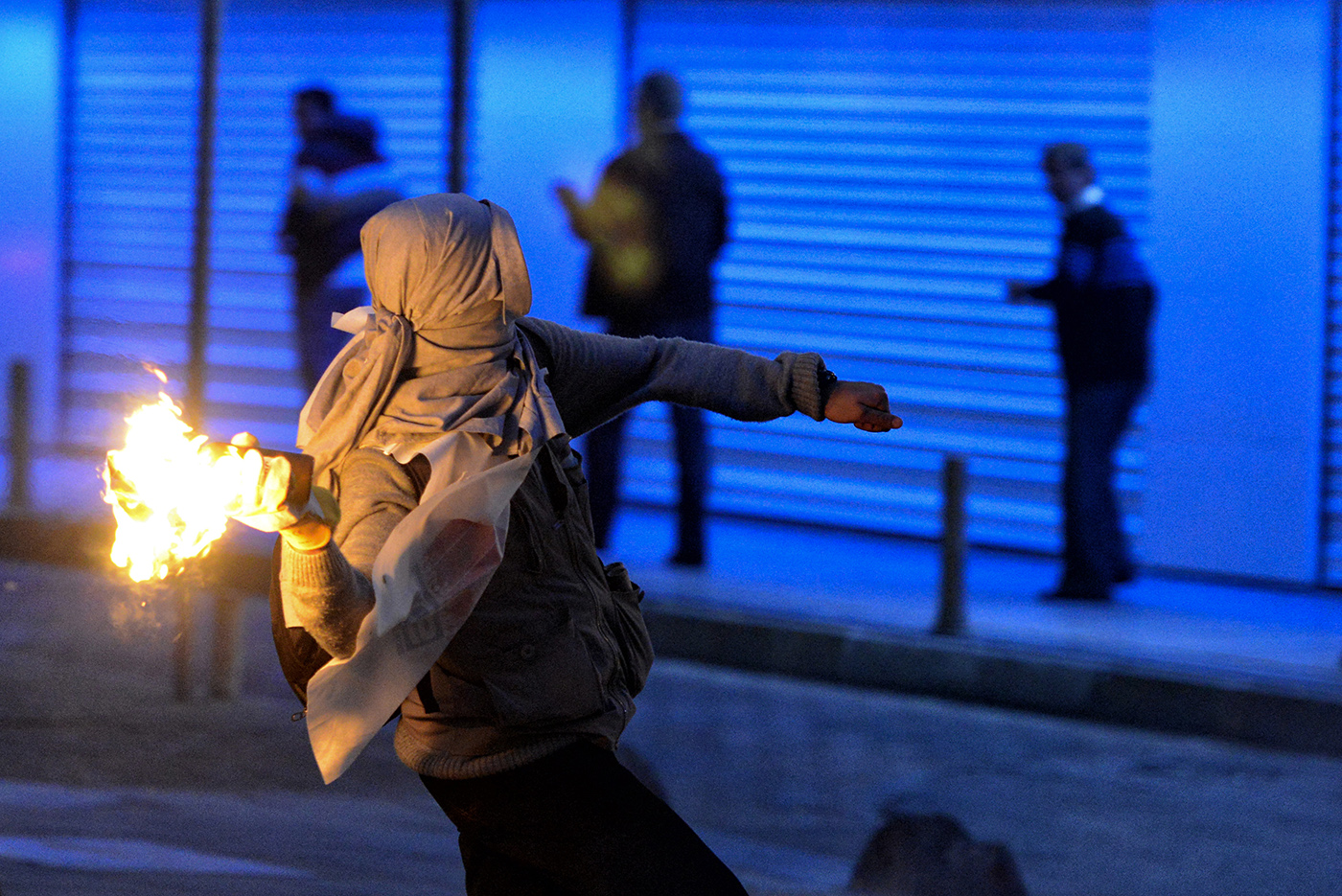 Turkish riot police clash with protestors during a demonstration for the victims of the Soma mine explosion, in Istanbul, Turkey, 15 May 2014.