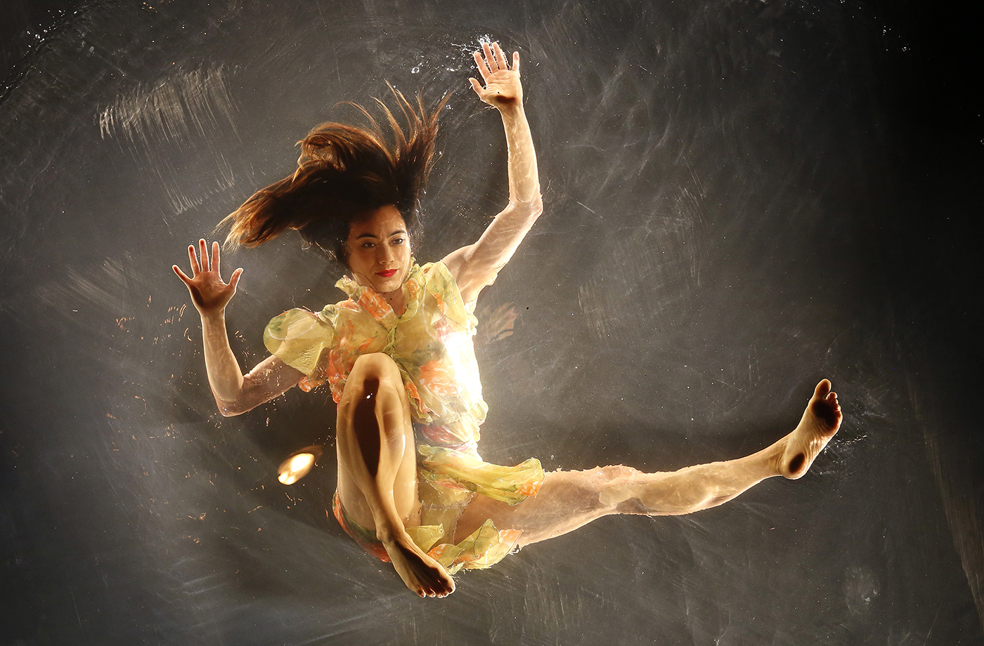 A dancer performs on a watery stage suspended above the audience during the Fuerza Bruta (Brute Force) show in Istanbul, Turkey, 16 November 2016