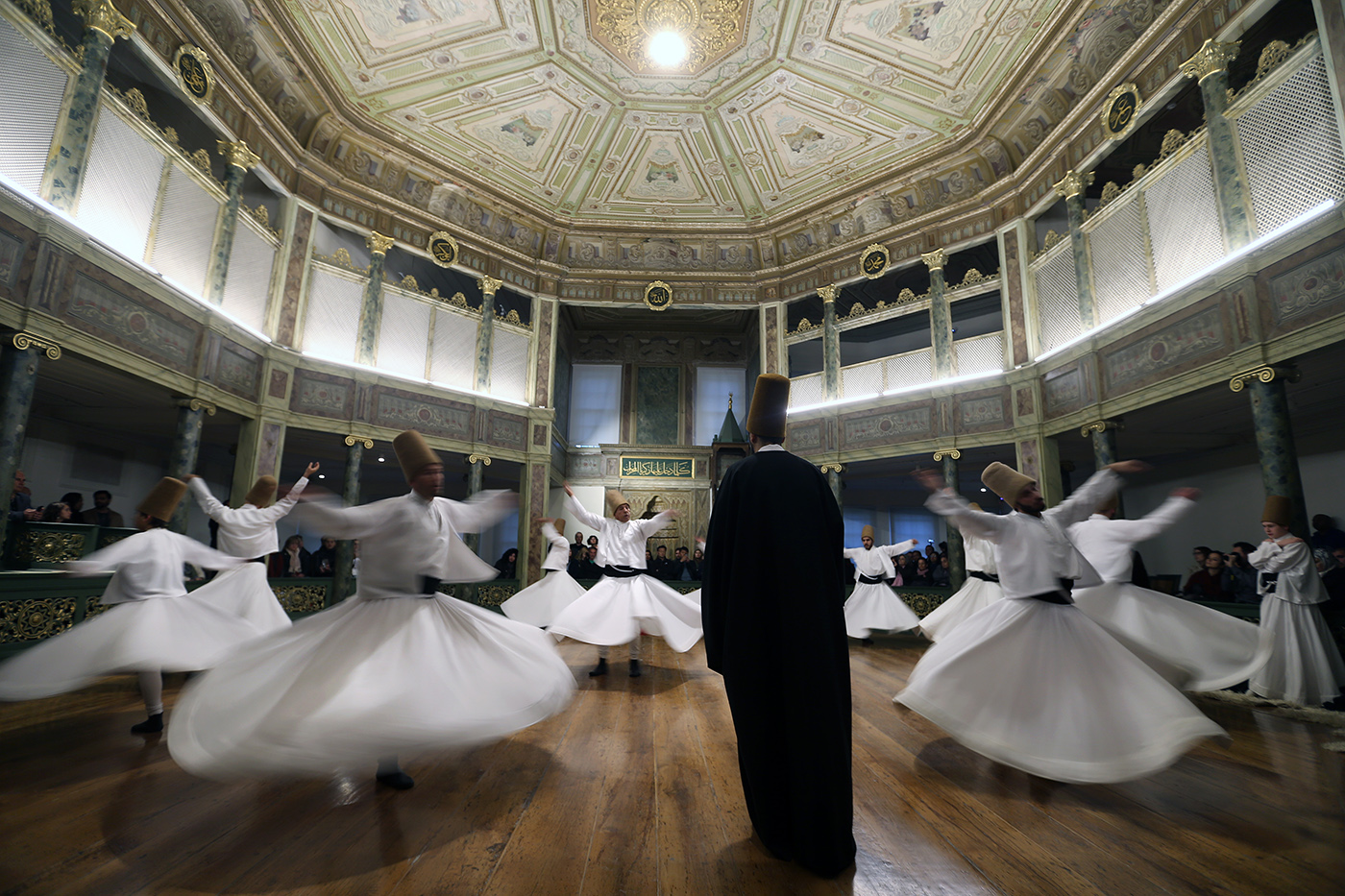 Whirling dervishes perform during the Mevlevi Sema Ceremony at Galata Mevlevihane cultural center in Istanbul, Turkey, 29 October 2017. The Sema is an old ritual combining whirling dervishes with music and poetry of Mevlana and chanting from Quran. The 13th-century poet Mevlana Jalal al-Din al-Rumi is an illustrious personage of Sufism, the mystical form of Islam that preaches tolerance and love.