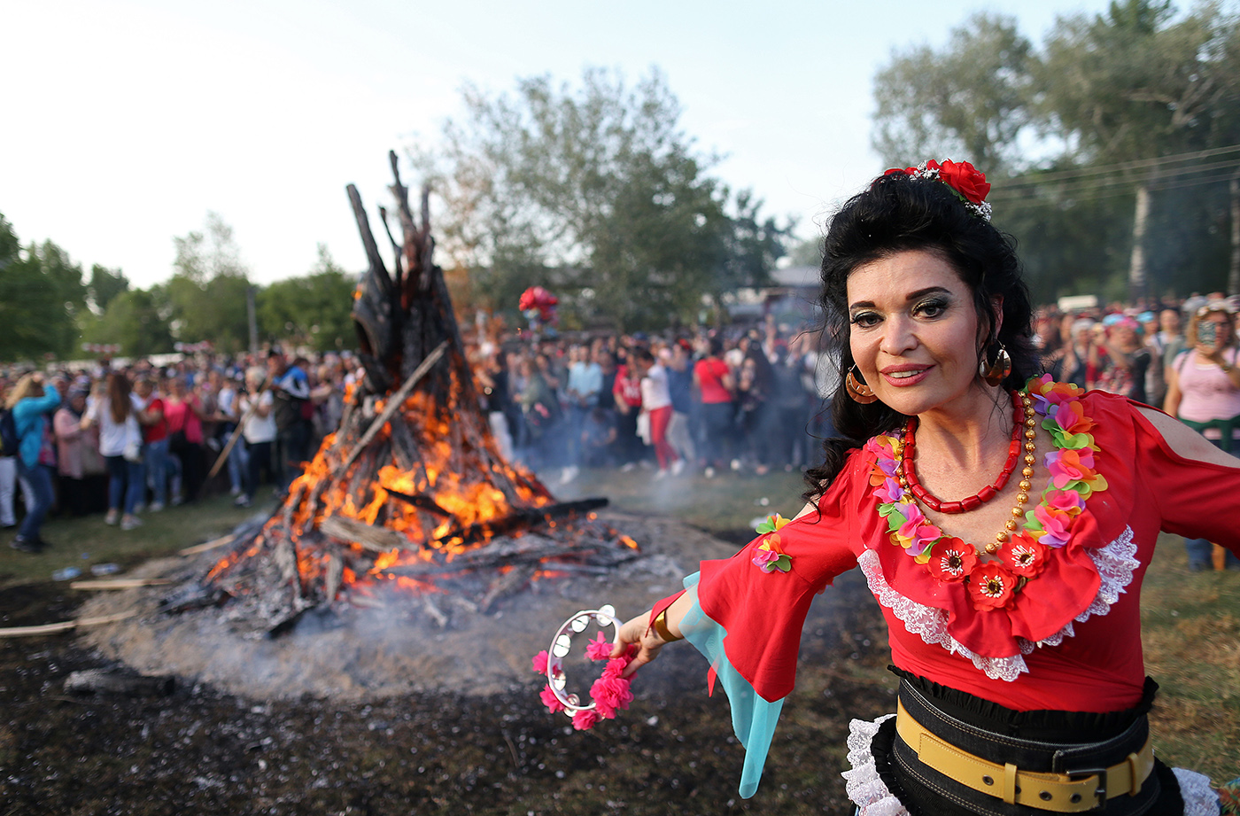 People dance around a huge fire during the Kakava festival in Edirne, Turkey, 05 May 2018. Kakava festival takes place to celebrate the arrival of spring by gypsies living in Turkey on 05 to 06 May each year. The fire is burned, danced around, skipped over. At the end of the day, wishes are written to a paper and left on the river.