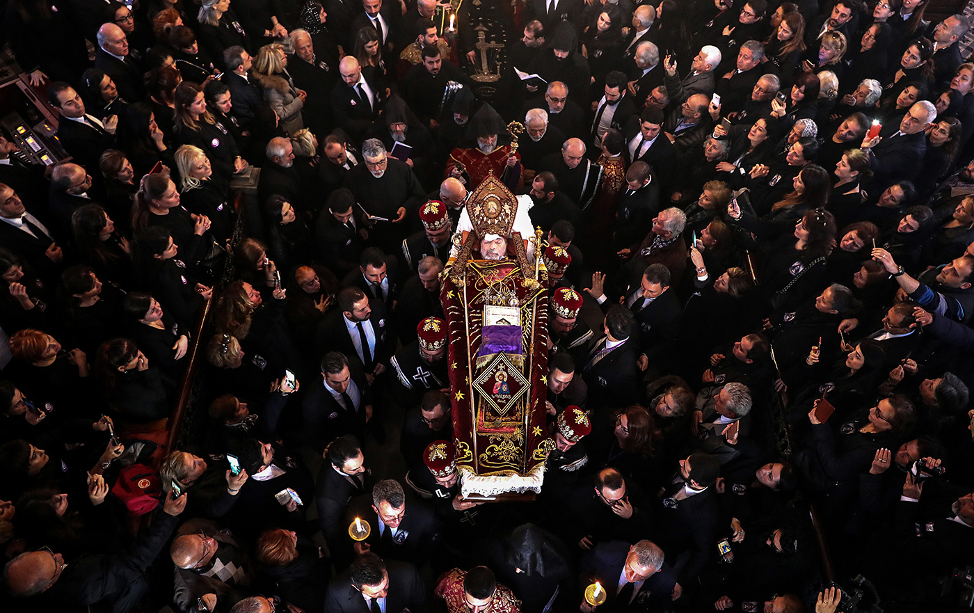 People carry the coffin of Archbishop Mesrob II Mutafyan of Armenian Patriarchate in Turkey during a funeral ceremony at Surp Asdvadzadzin Patriarchate Church in Istanbul, Turkey, 17 March 2019. 