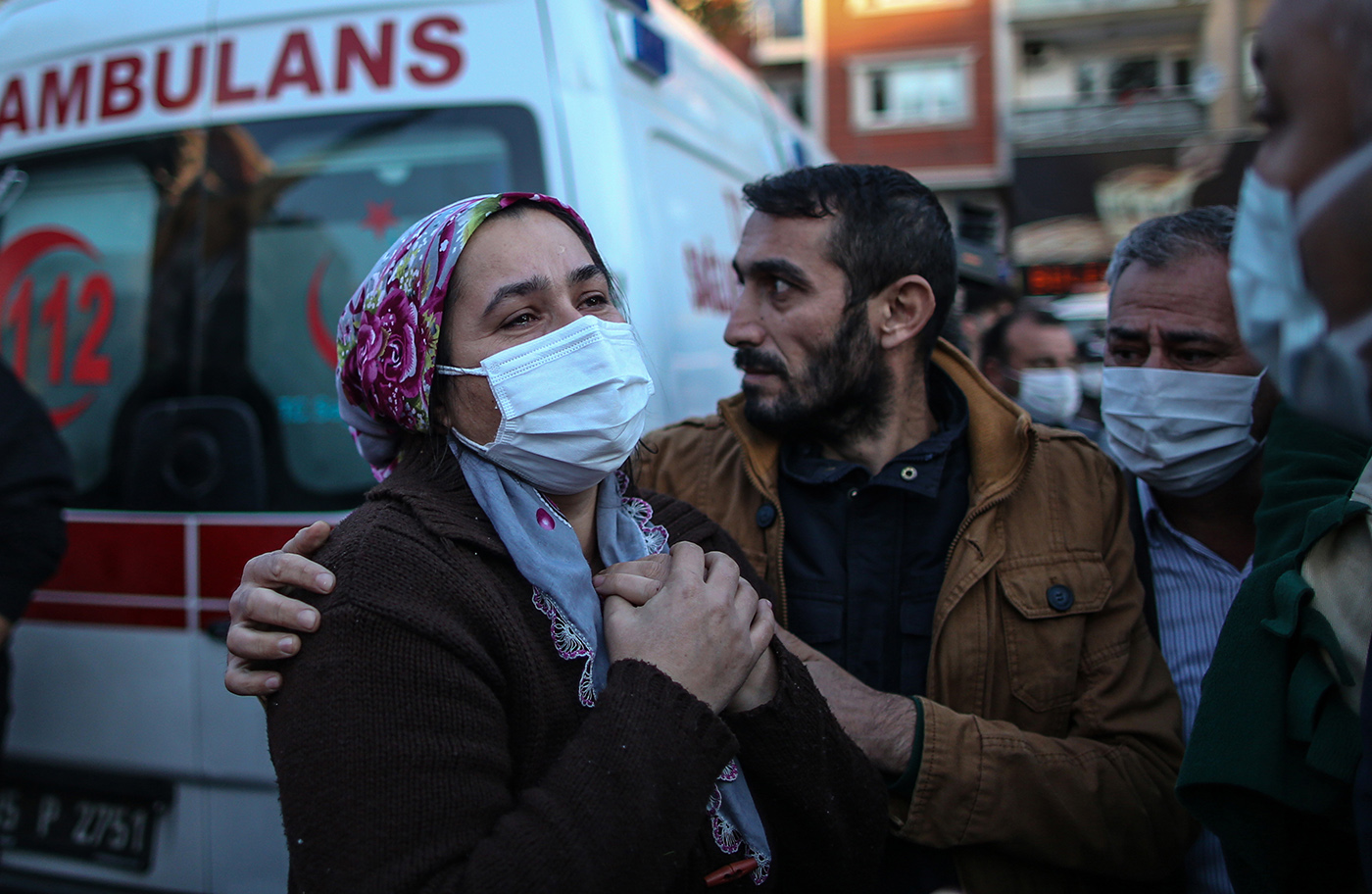 A woman waits for a news from their relatives believed to be trapped under collapsed buildings  after a 7.0 magnitude earthquake in the Aegean Sea, at Bayrakli district in Izmir, Turkey, 31 October 2020. According to Turkish media reports, at least twenty four people died while more than eight  hundreds were injured and dozens of buildings were destroyed in the earthquake.