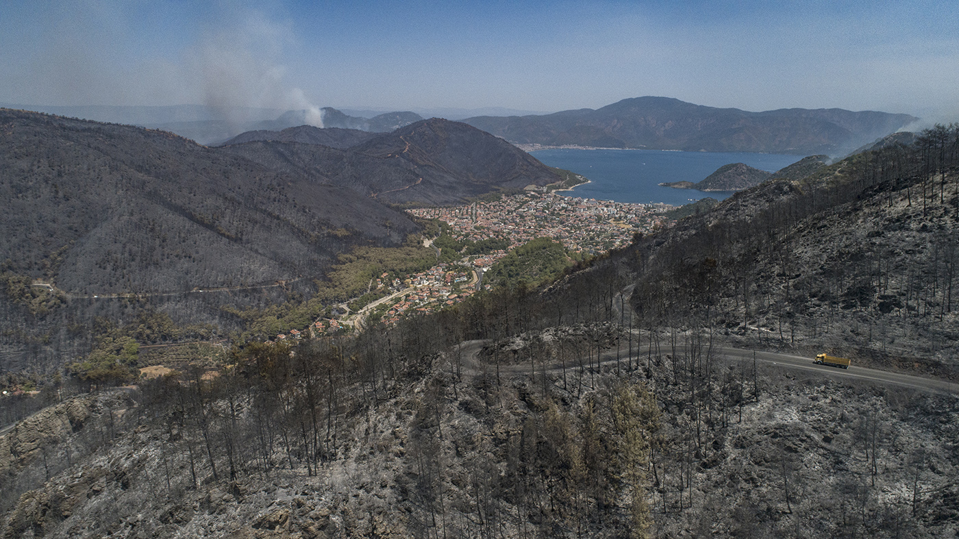 An aerial view taken with a drone shows a wildfires area at the rural of Marmaris district of Mugla, Turkey, 31 July 2021. According to a statement by the Turkish government