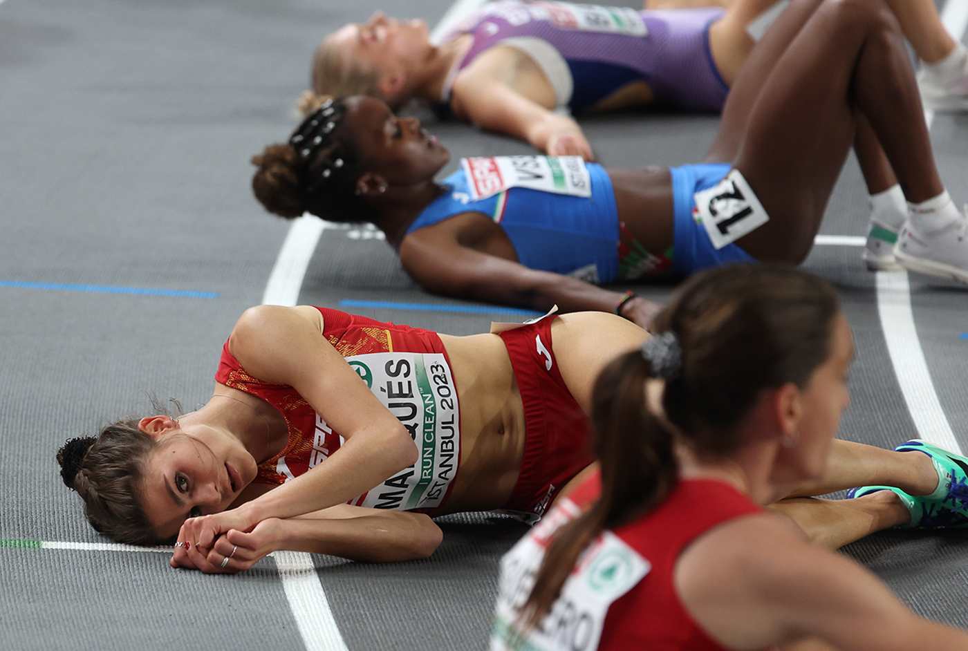 Agueda Marques of Spain lies on the track after the Women